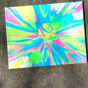 Spin art painting, good for wall decor.